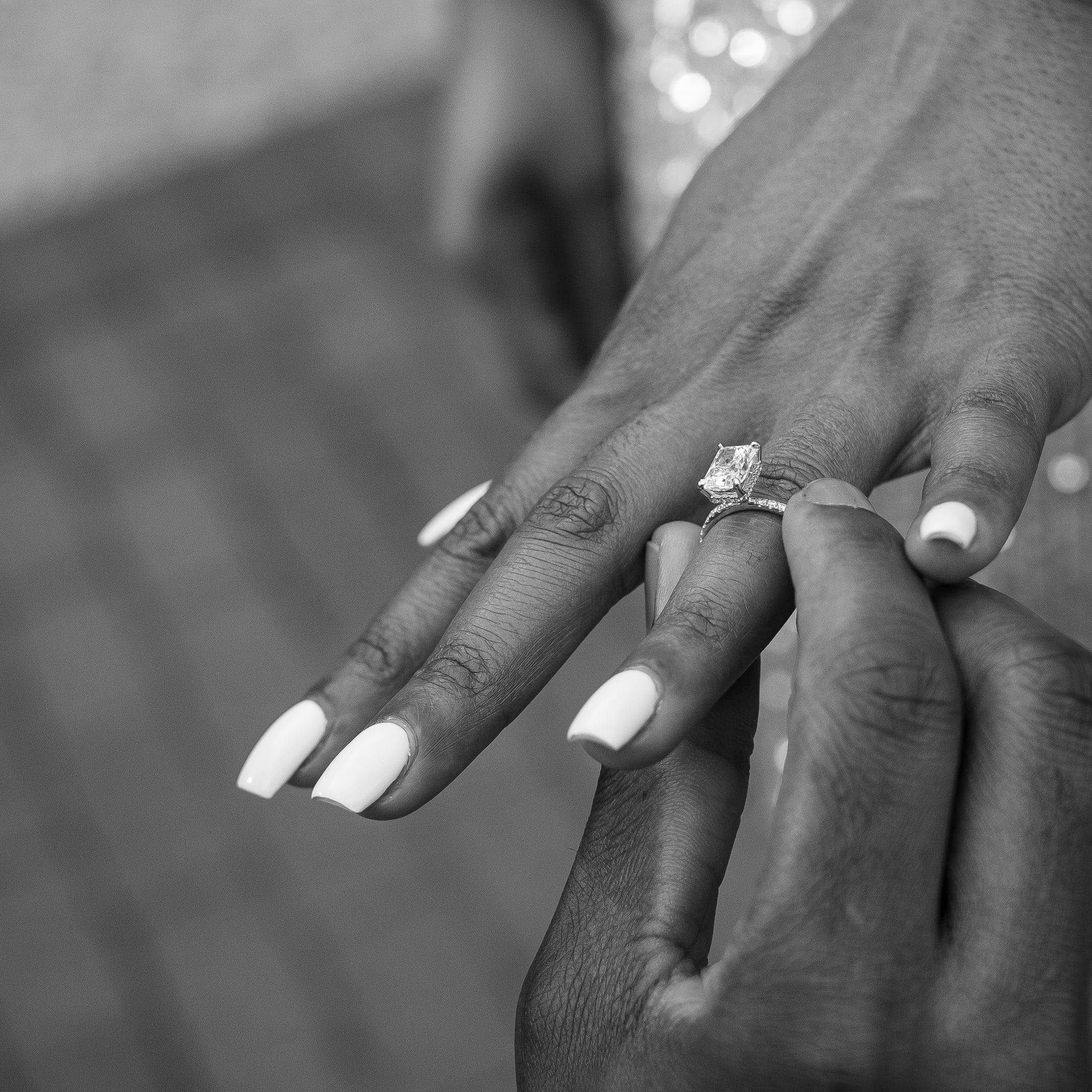 Detail portrait of hands and a ring