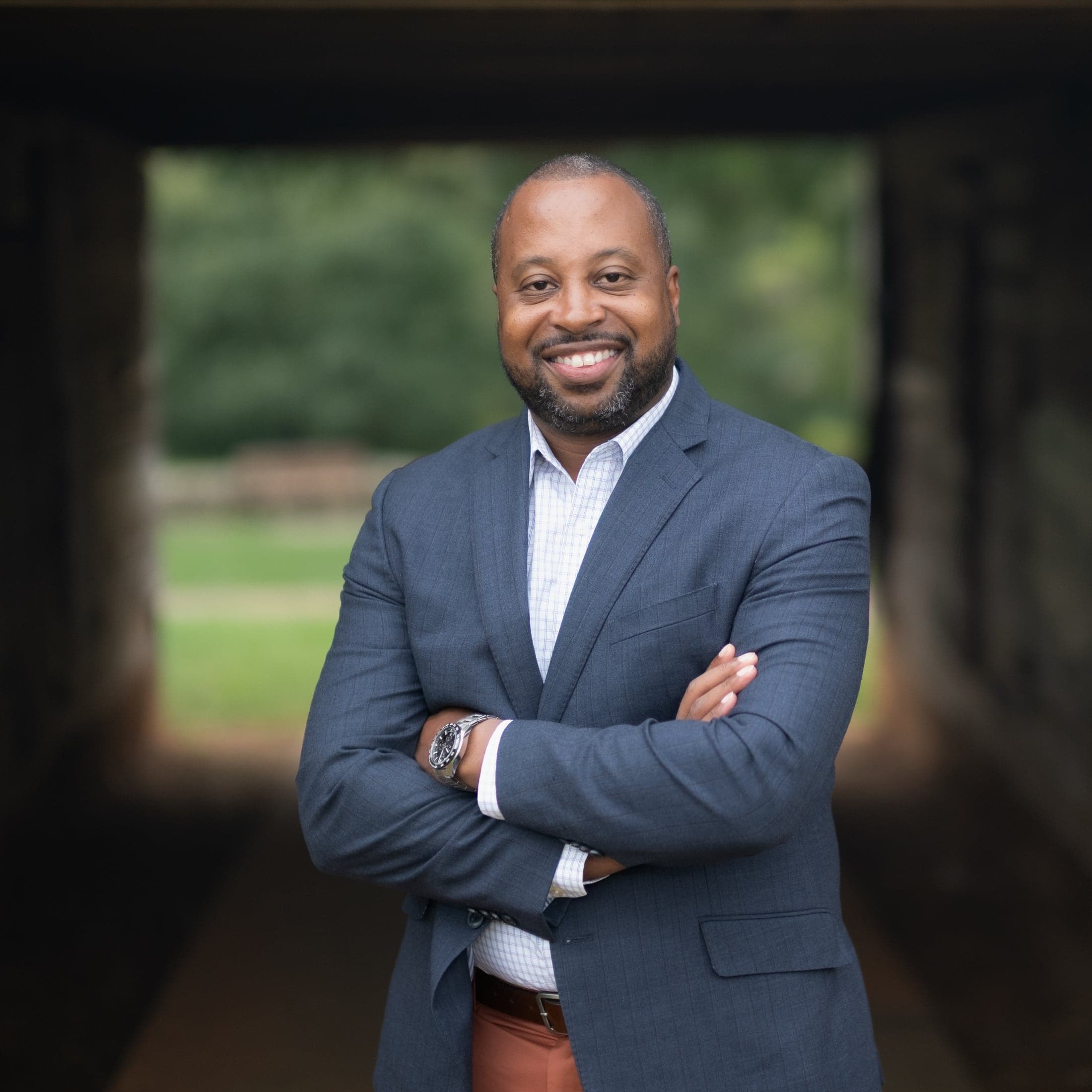 Portrait beneath a stone archway