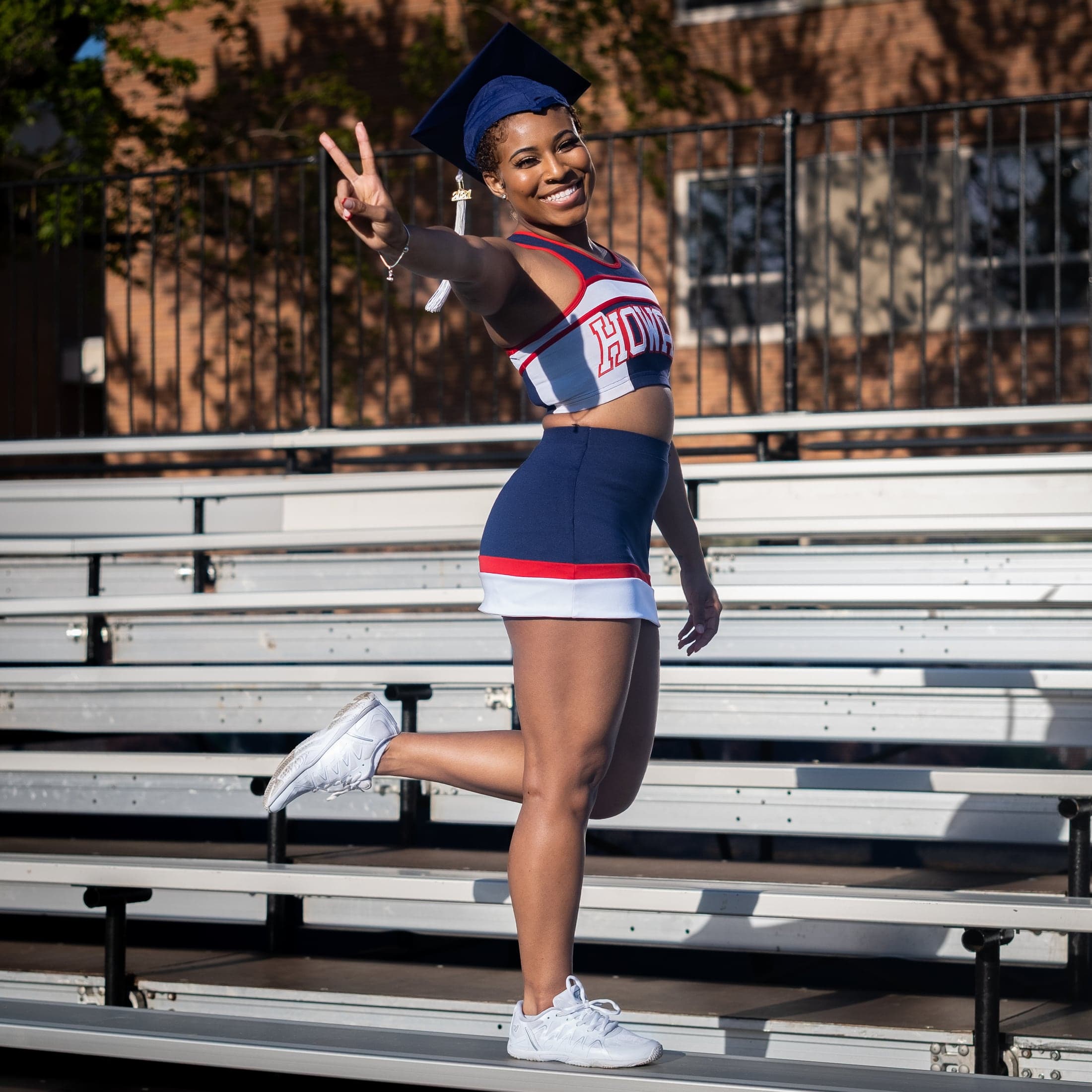 Graduate celebrating with confetti
