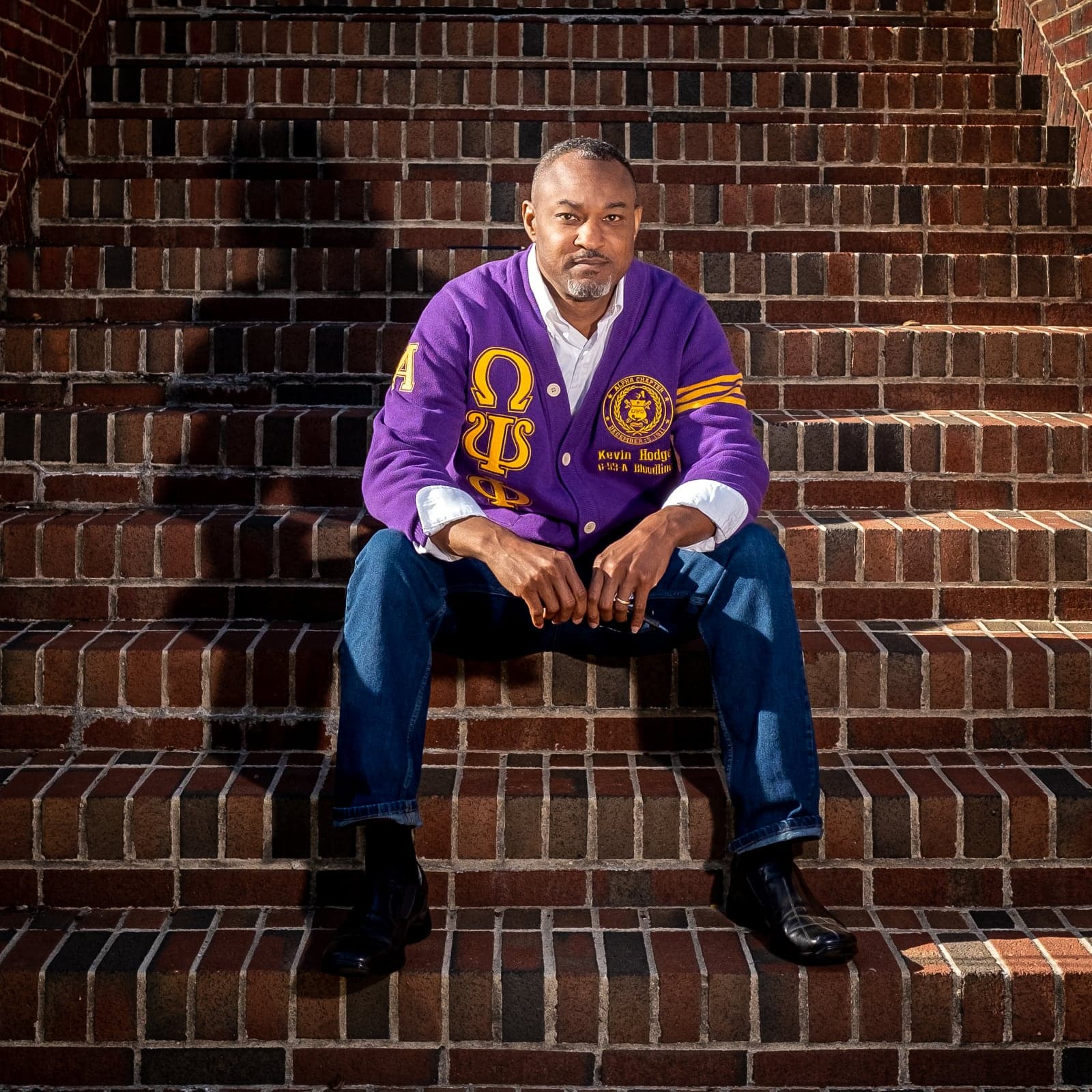 Portrait on brick steps downtown