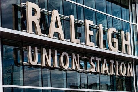 Close-up of the Raleigh Union Station sign in gold letters