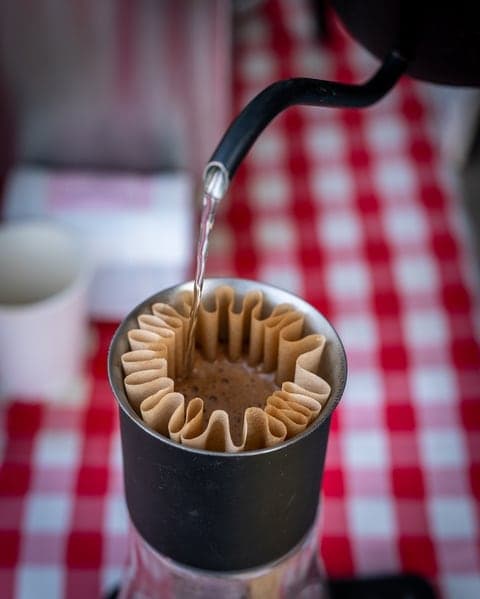 Pour-over coffee at a local market stand